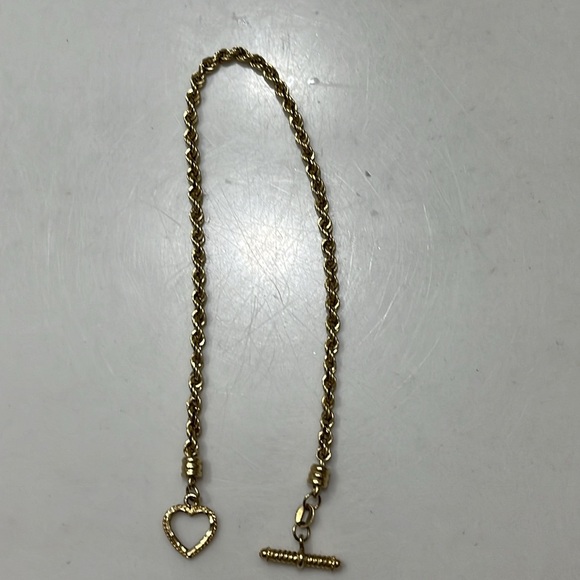 Beautiful 14 kt yellow gold rope bracelet heart toggle closure. Approx 2.46 g. - Picture 6 of 13